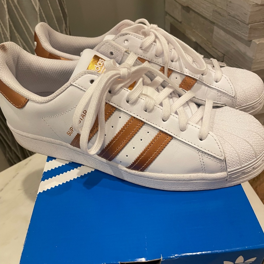 Adidas Superstar White Sneakers with Copper Stripes and Gold Details